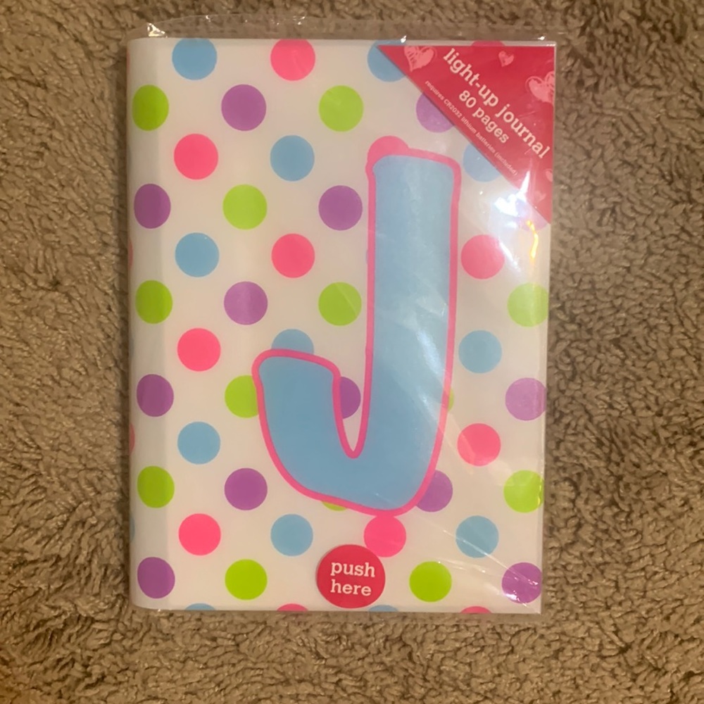 Justice “J” monogram light-up notebook